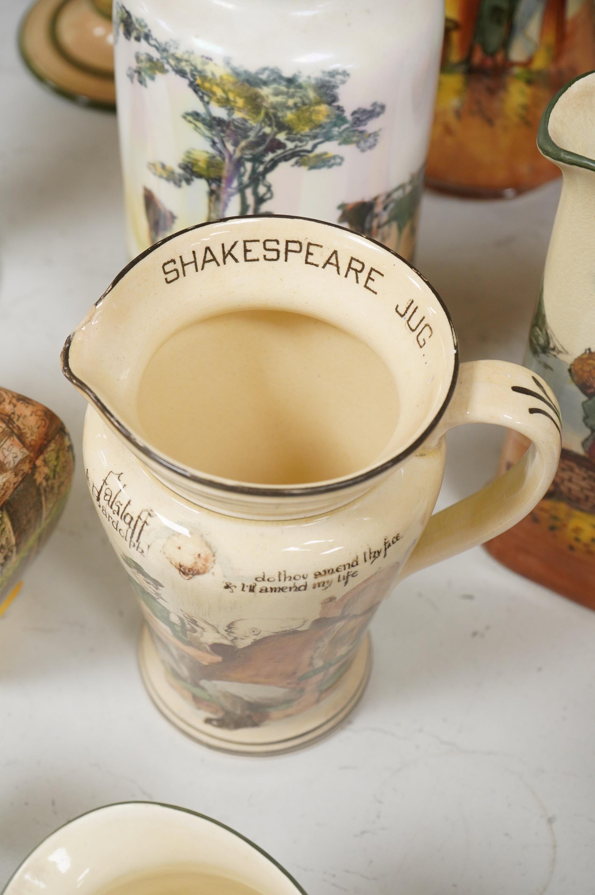 A collection of Royal Doulton series ware jugs, vases and candlesticks, largest 22cm high